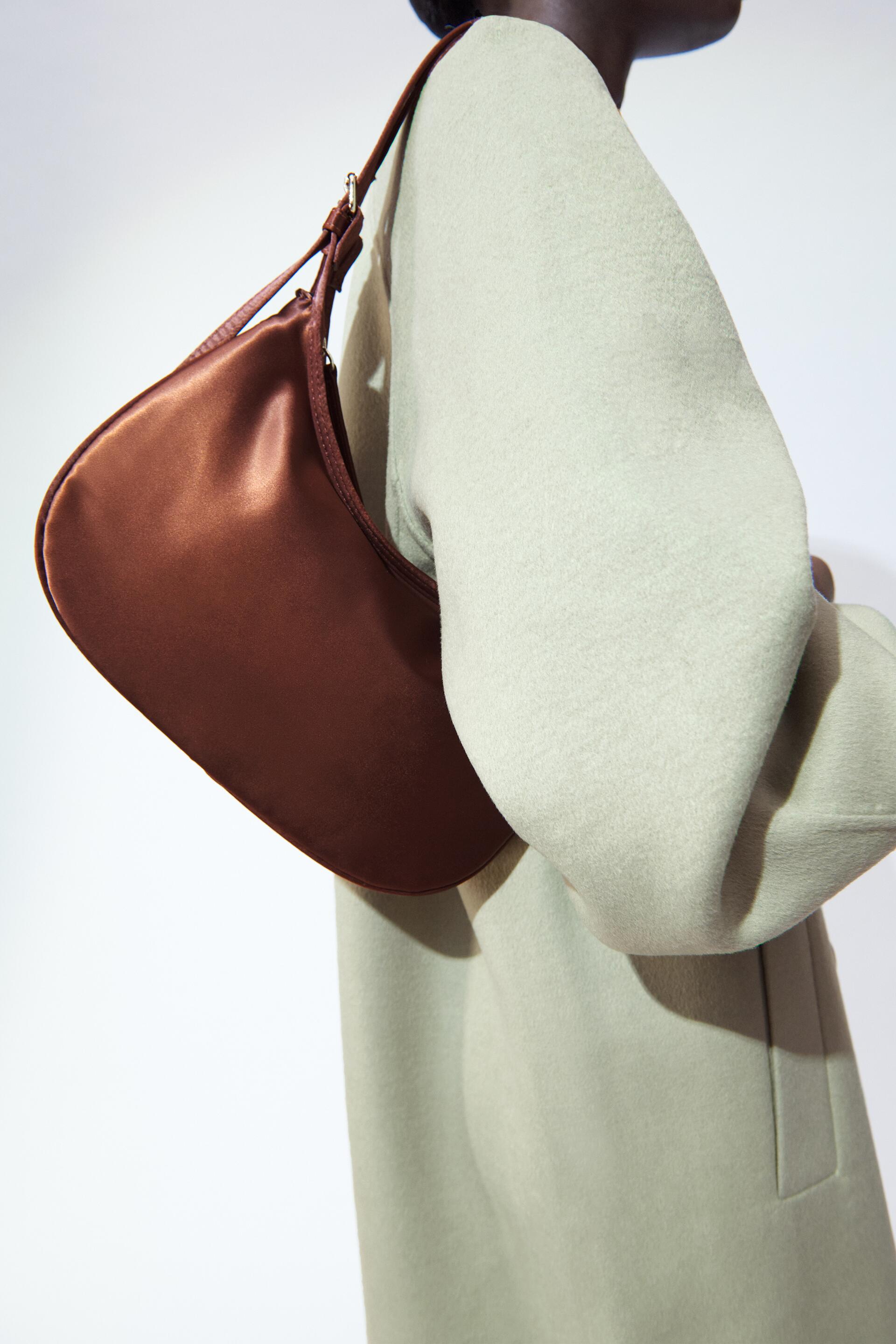 Weekday 90s raw edge buckle detail shoulder bag in khaki | ASOS